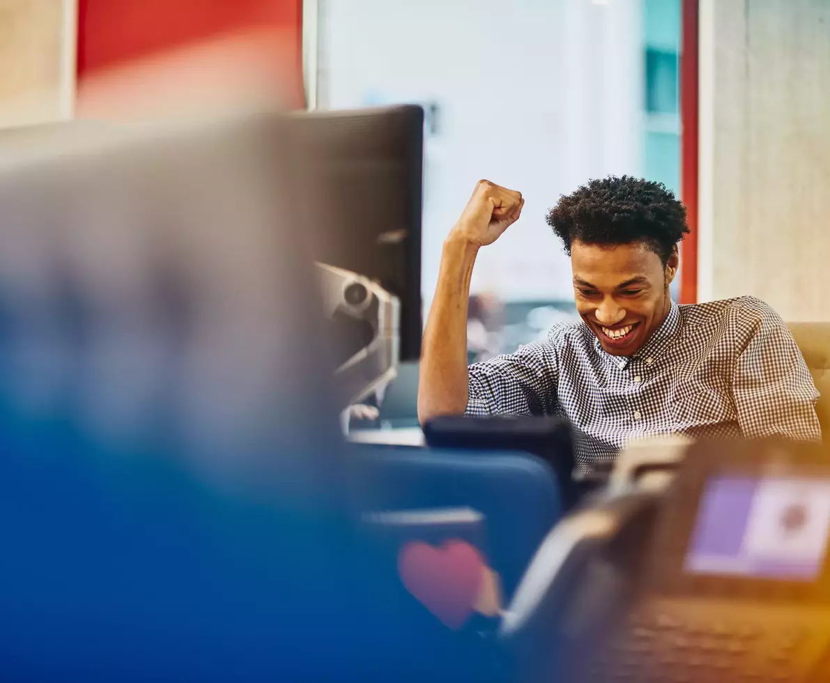 male worker cheering